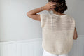 Cream crochet top with grid-like rattan texture